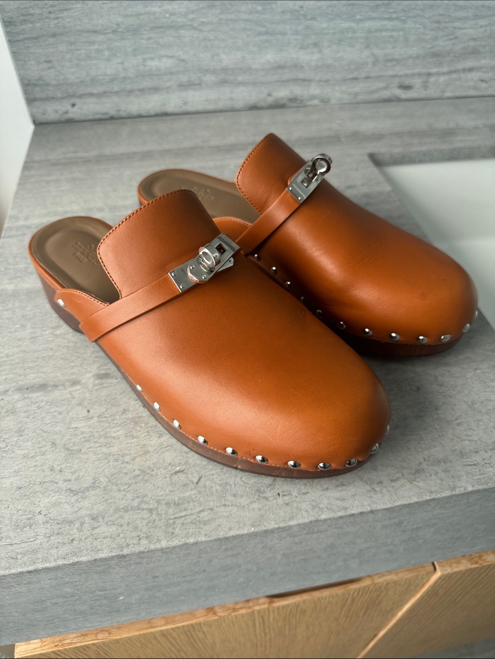 Hermes Orange Leather Slip-On Clogs with Silver Buckle